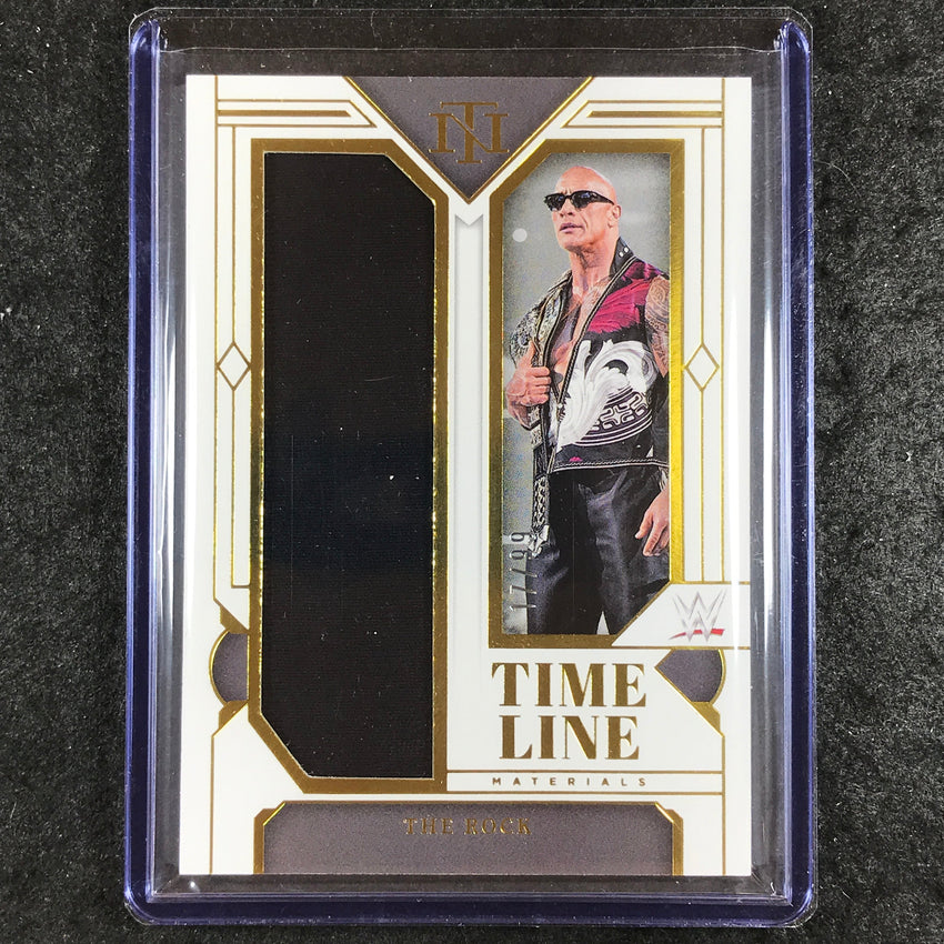 2024 National Treasures WWE THE ROCK Timeline Materials Relic Gold 17/99