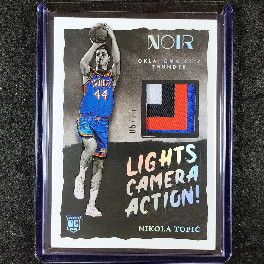 2024-25 Noir NIKOLA TOPIC Lights Camera Action Rookie Patch International 5/15