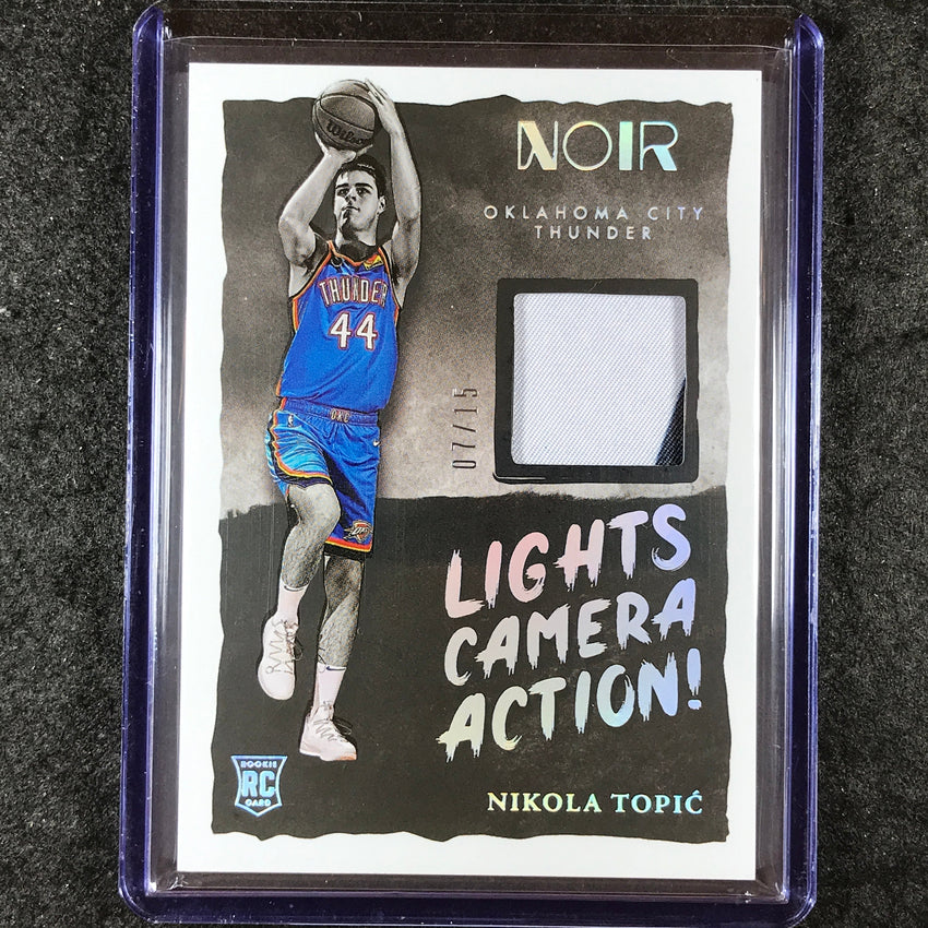 2024-25 Noir NIKOLA TOPIC Lights Camera Action Rookie Patch International 7/15