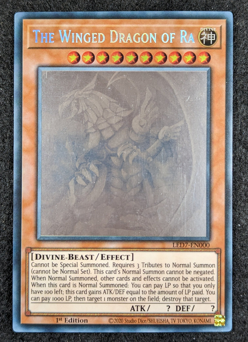 (A) GHOST RARE The Winged Dragon of Ra - LED7-EN000 Ghost Rare 1st Edition (A)