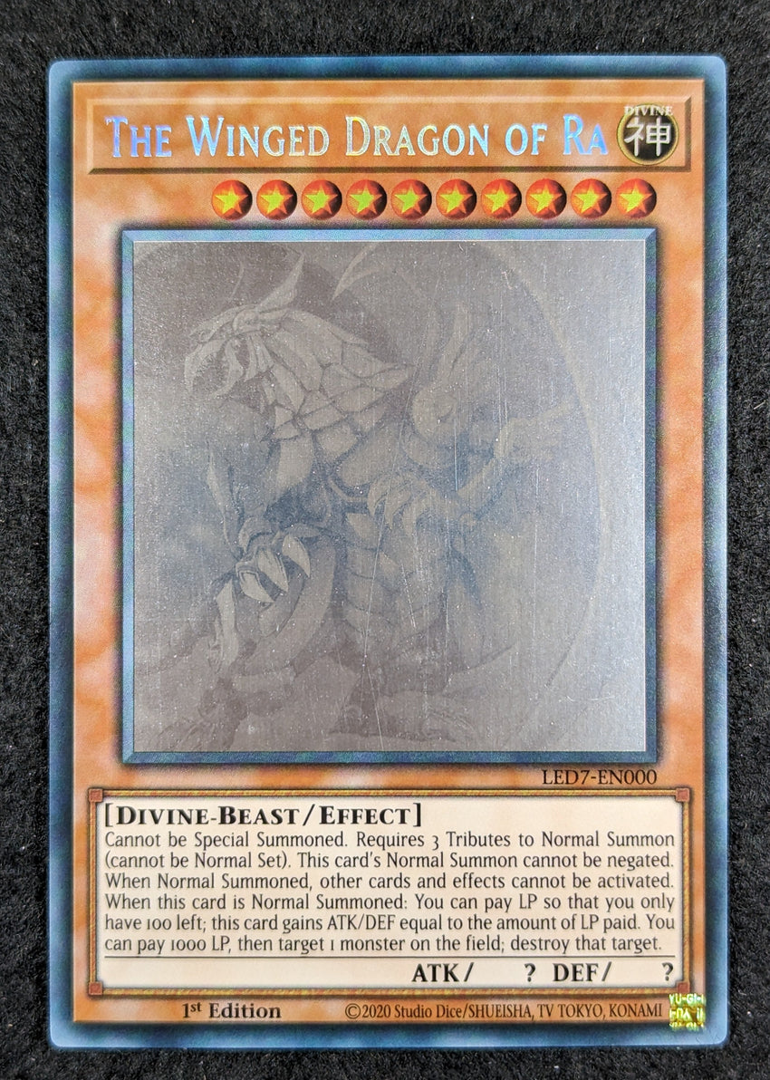 (B) GHOST RARE The Winged Dragon of Ra - LED7-EN000 Ghost Rare 1st Edition (B)