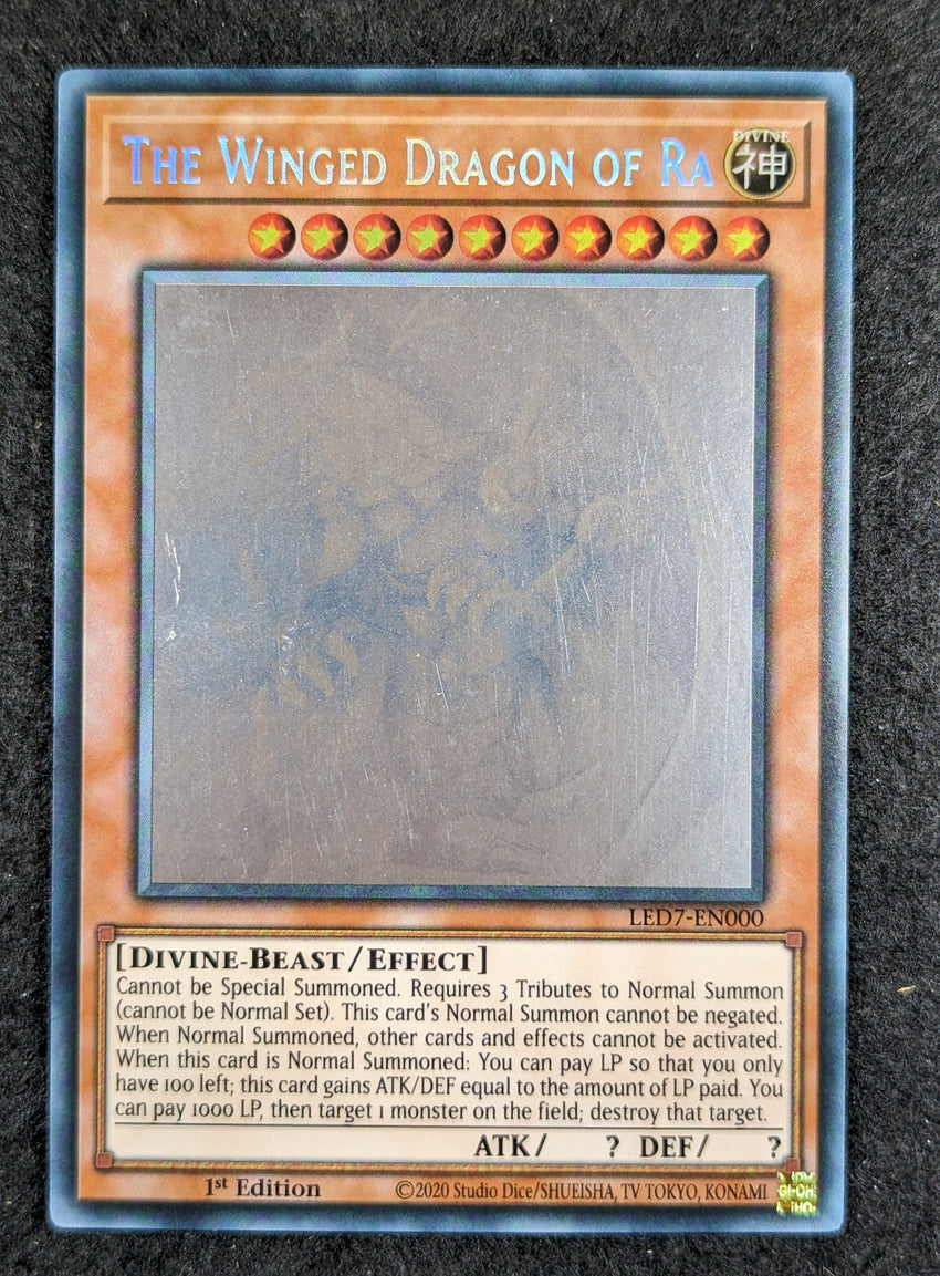 (C) LIGHTLY PLAYED GHOST RARE The Winged Dragon of Ra - LED7-EN000 Ghost Rare 1st Edition