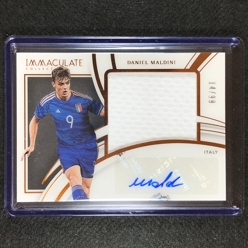2022-23 Immaculate Daniel Maldini Premium Swatch Relic Auto Bronze 14/99