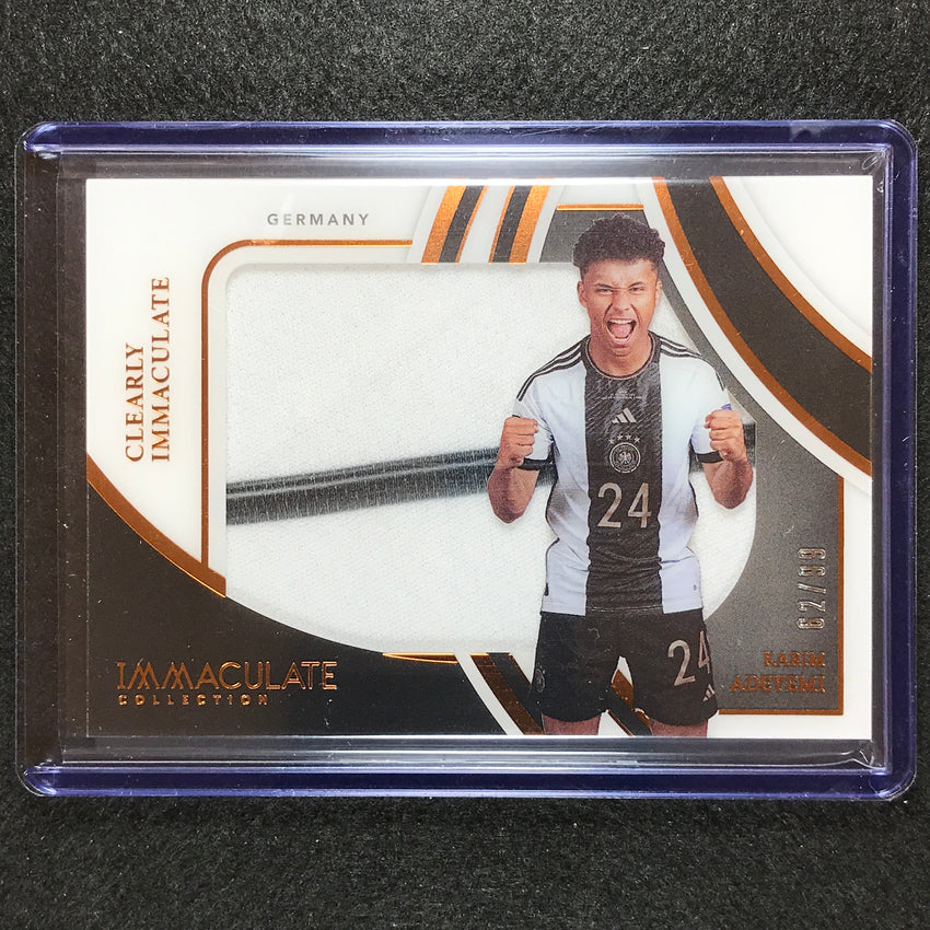 2022-23 Immaculate Karim Adeyemi Clearly Immaculate Jersey Relic Bronze 62/99