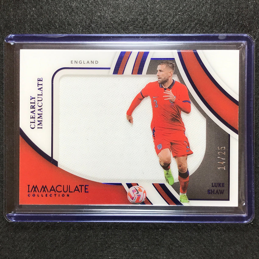 2022-23 Immaculate Luke Shaw Clearly Immaculate Jersey Relic Sapphire 14/25