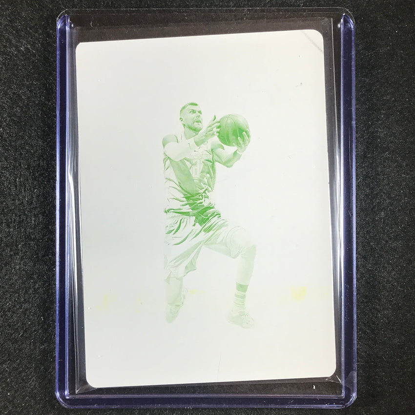 2022-23 National Treasures Kristaps Porzingis Obsidian Printing Plate Yellow 1/1