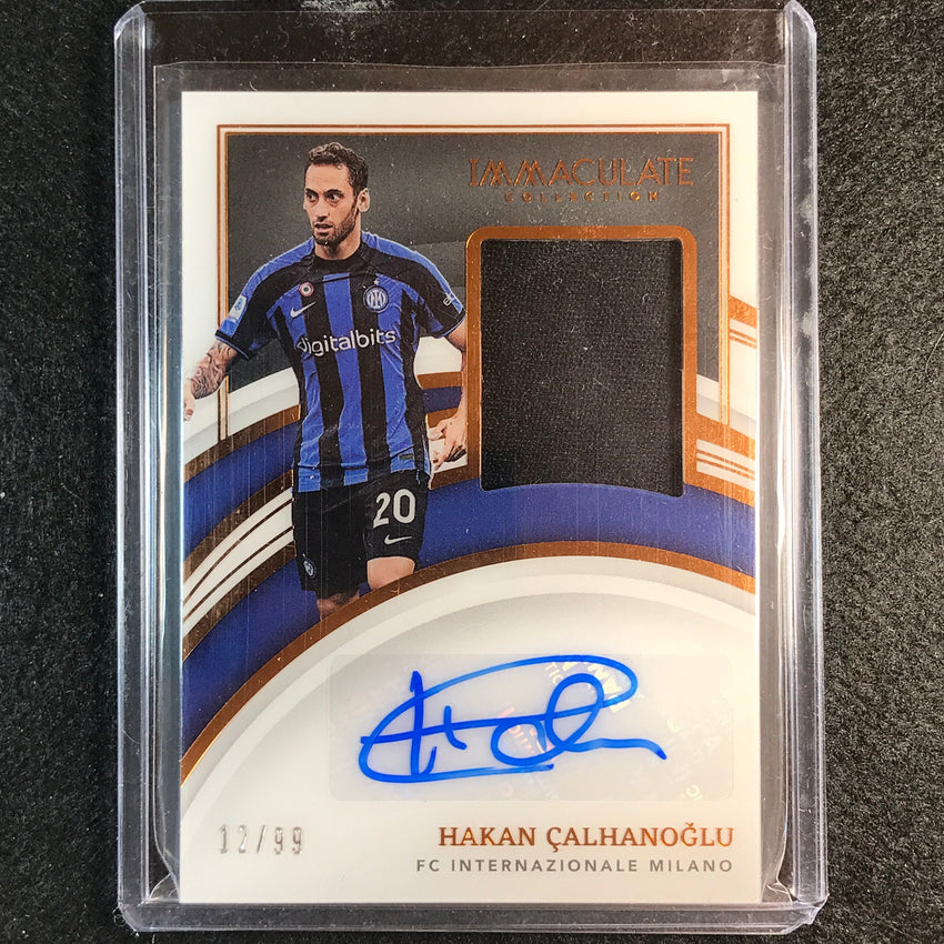 2022-23 Immaculate Hakan Calhanoglu Memorabilia Relic Auto Bronze 12/99