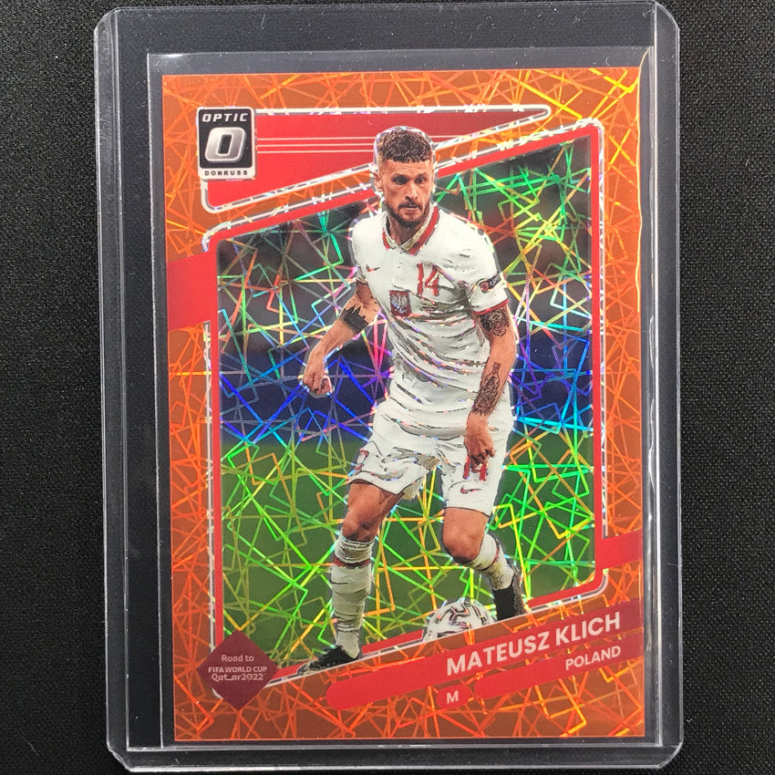 2021-22 Donruss Road To Qatar Mateusz Klich Optic Orange Velocity 8/49