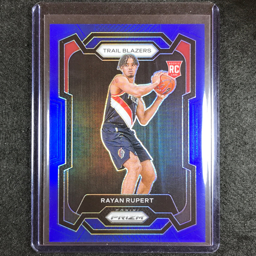 2023-24 Prizm Rayan Rupert Rookie Base Blue 26/199 No 140